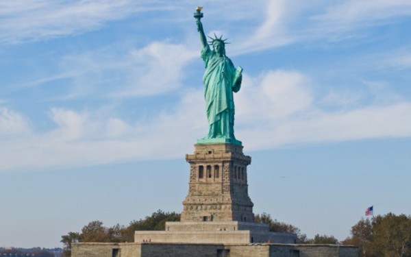 The Statue of Liberty against a blue sky