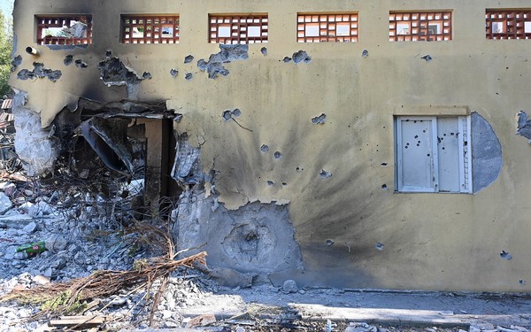 Bullet-riddled, burned building in Kibbutz Be'eri after the October 7, 2023 Hamas massacre